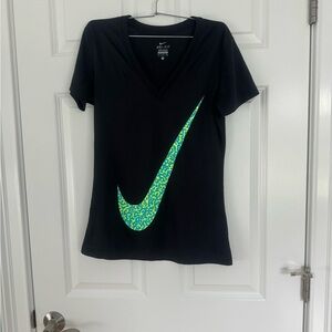 Women’s Dri-Fit Black with Swoosh top. Size small
